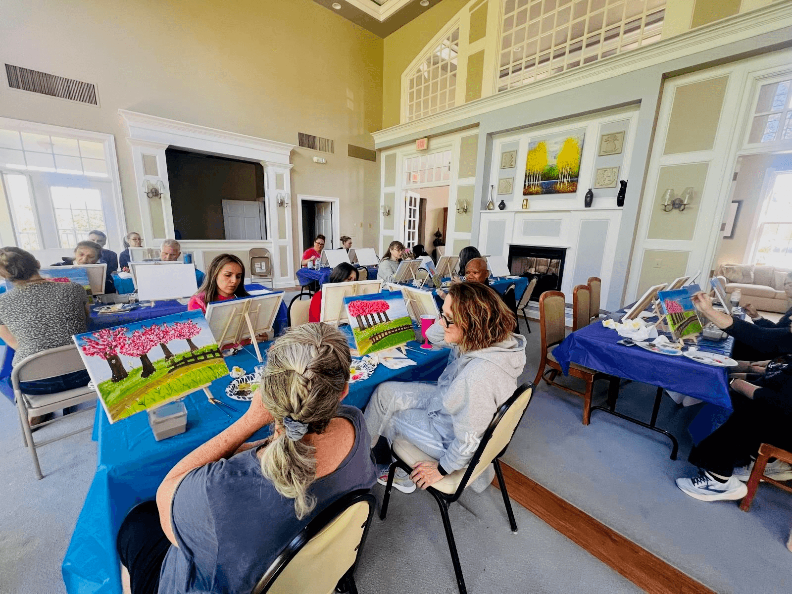 Group canvas painting session