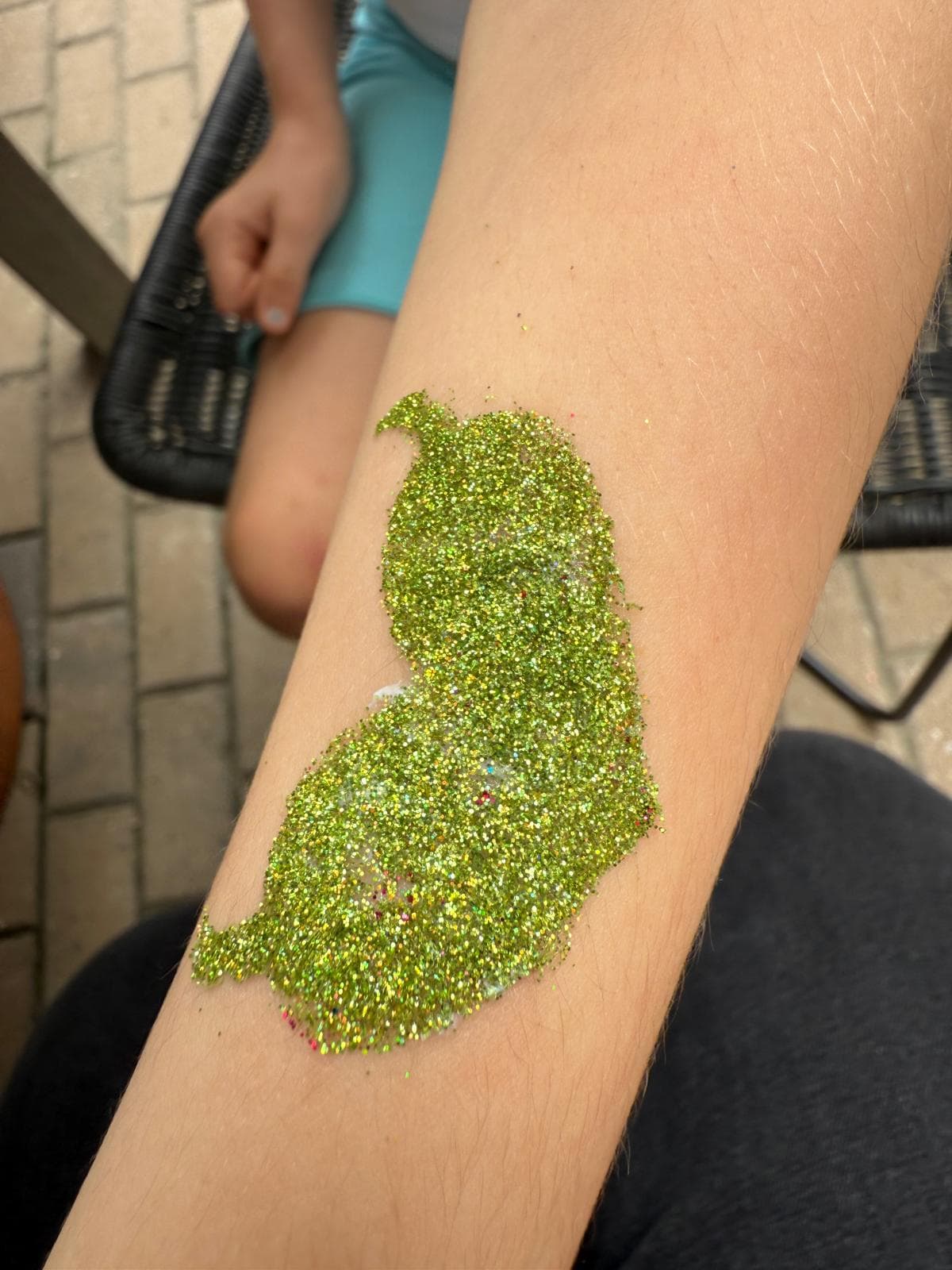 Colorful glitter tattoo art